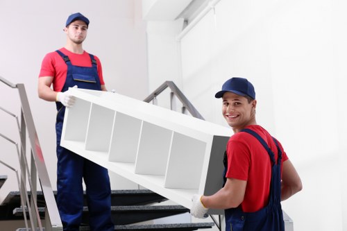 Removal team loading household furniture in Crystal Palace
