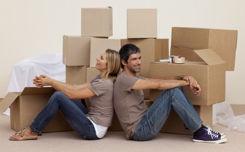 Careful loading of household items during a Crystal Palace flat relocation