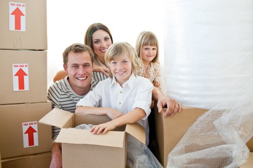 Packed moving boxes and furniture for a local removal job